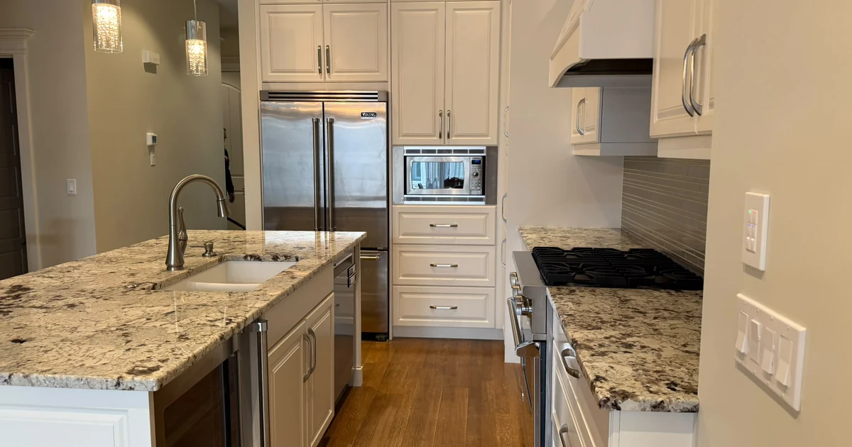 Kitchen cabinets after refinishing by MV Painting Inc.